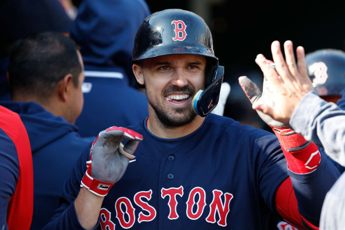 Apr 8, 2023; Detroit, Michigan, USA; Boston Red Sox center fielder Adam Duvall (18) receives congratulations from teammates after he hits a three run home run in the third inning against the Detroit Tigers at Comerica Park.
